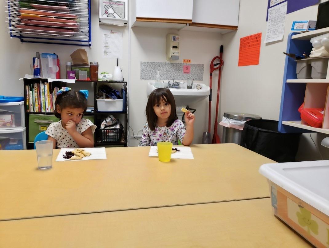 Children eating at All Families Welcome