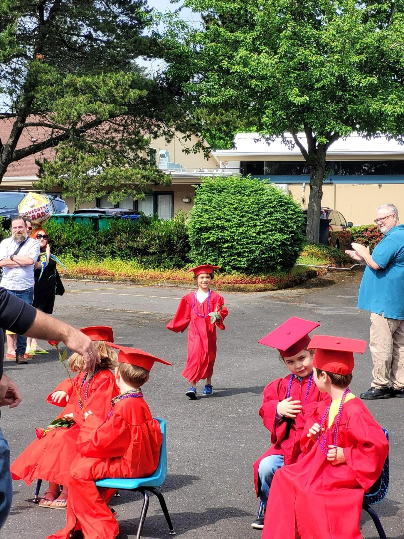 Child walks graduation