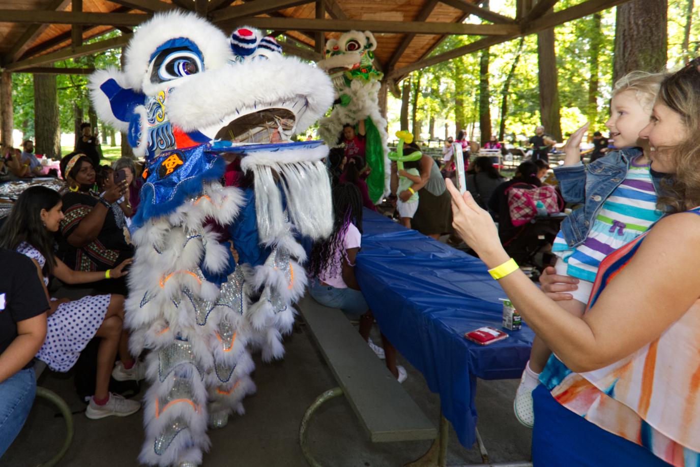 lion dancers smile