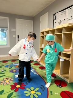 Kids dressed as doctors as Learning Days