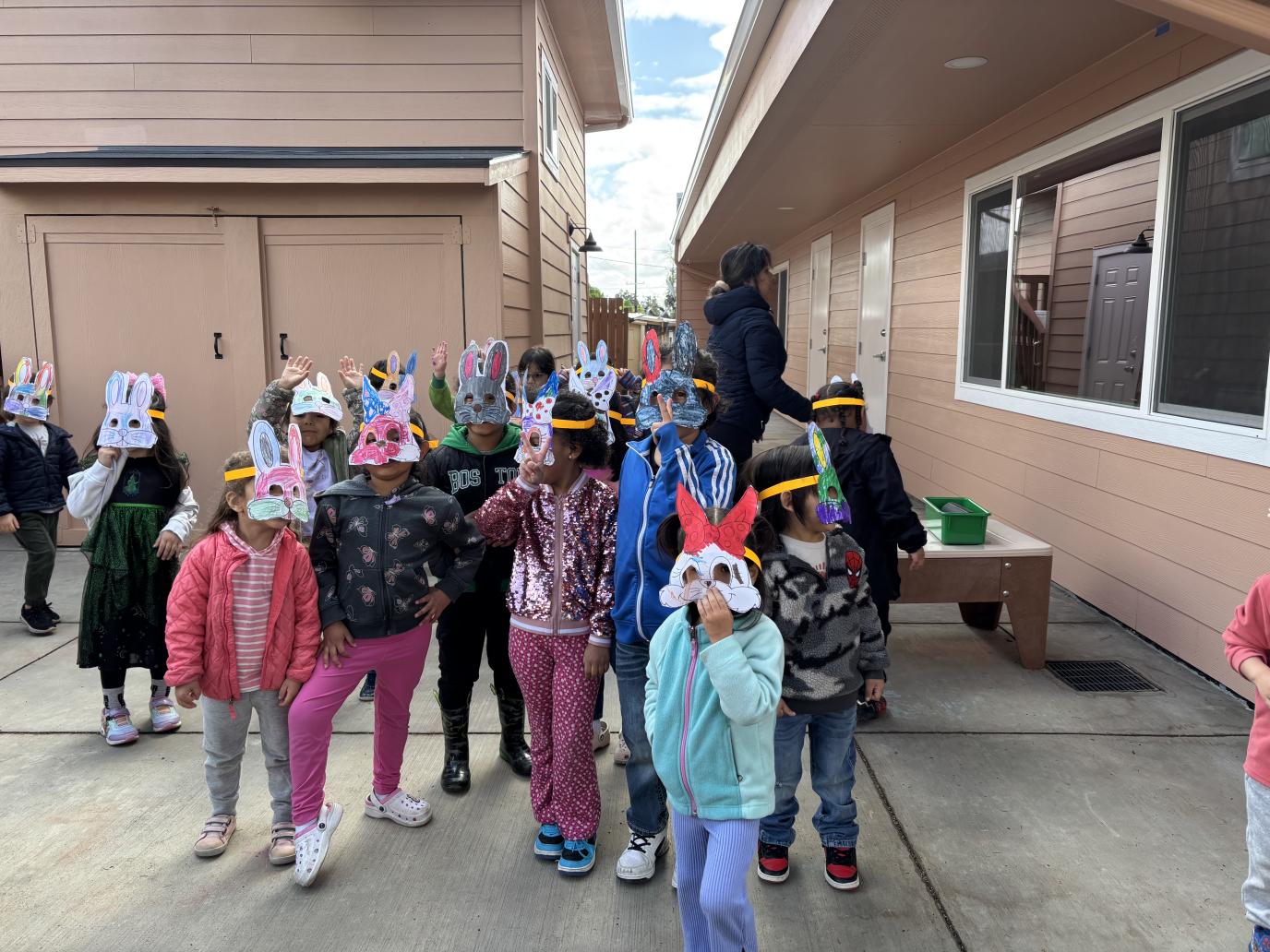 Kids in bunny masks at Peqeños Exploradores